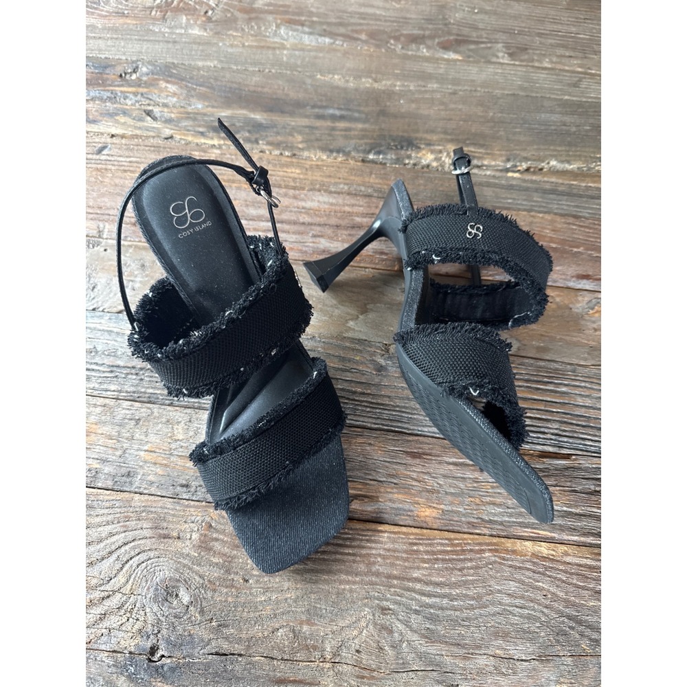 Cozy Island black denim
Tweed heeled sandals NWOT size 9.5